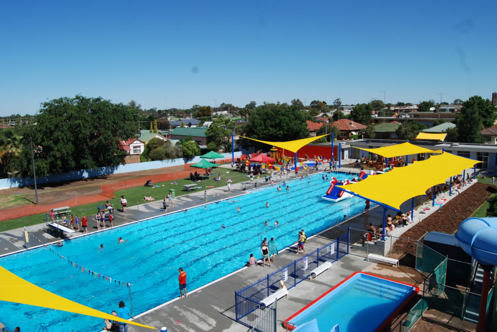 Aerial view of Holland Park Pool in West Wyalong, showing the swimming pool and surrounding facilities. 