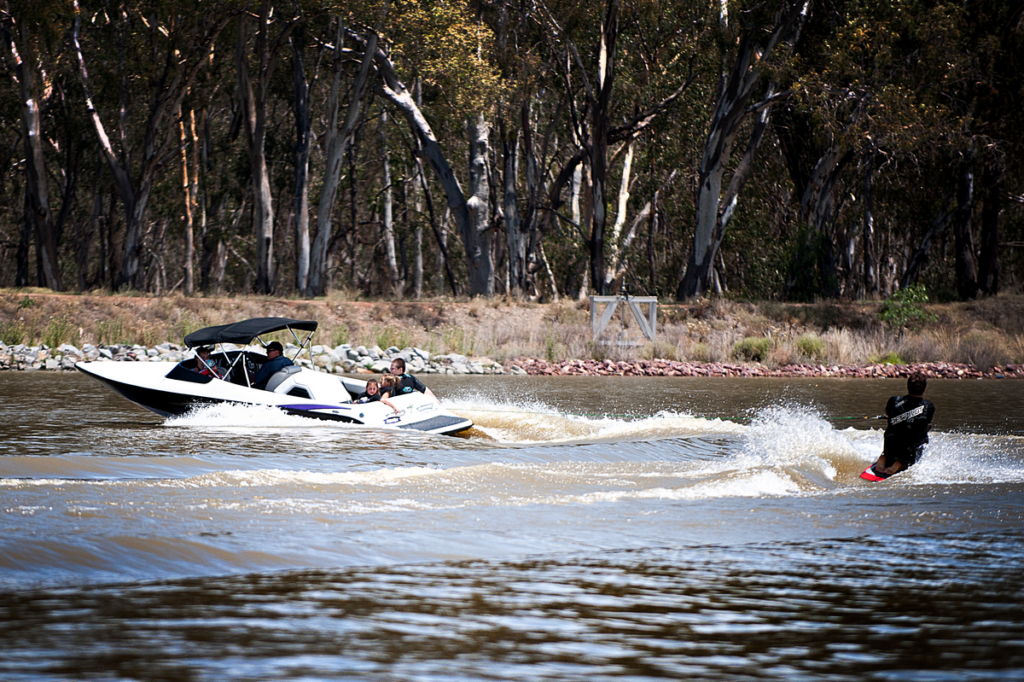 Image shows a boat pulling a water skier on Lake Talbot, Narrandera